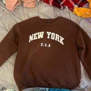brown New York crewneck